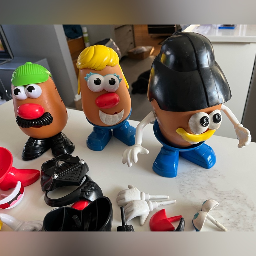 Mr potato head and accessories. Includes three potato heads. - Picture 3 of 5
